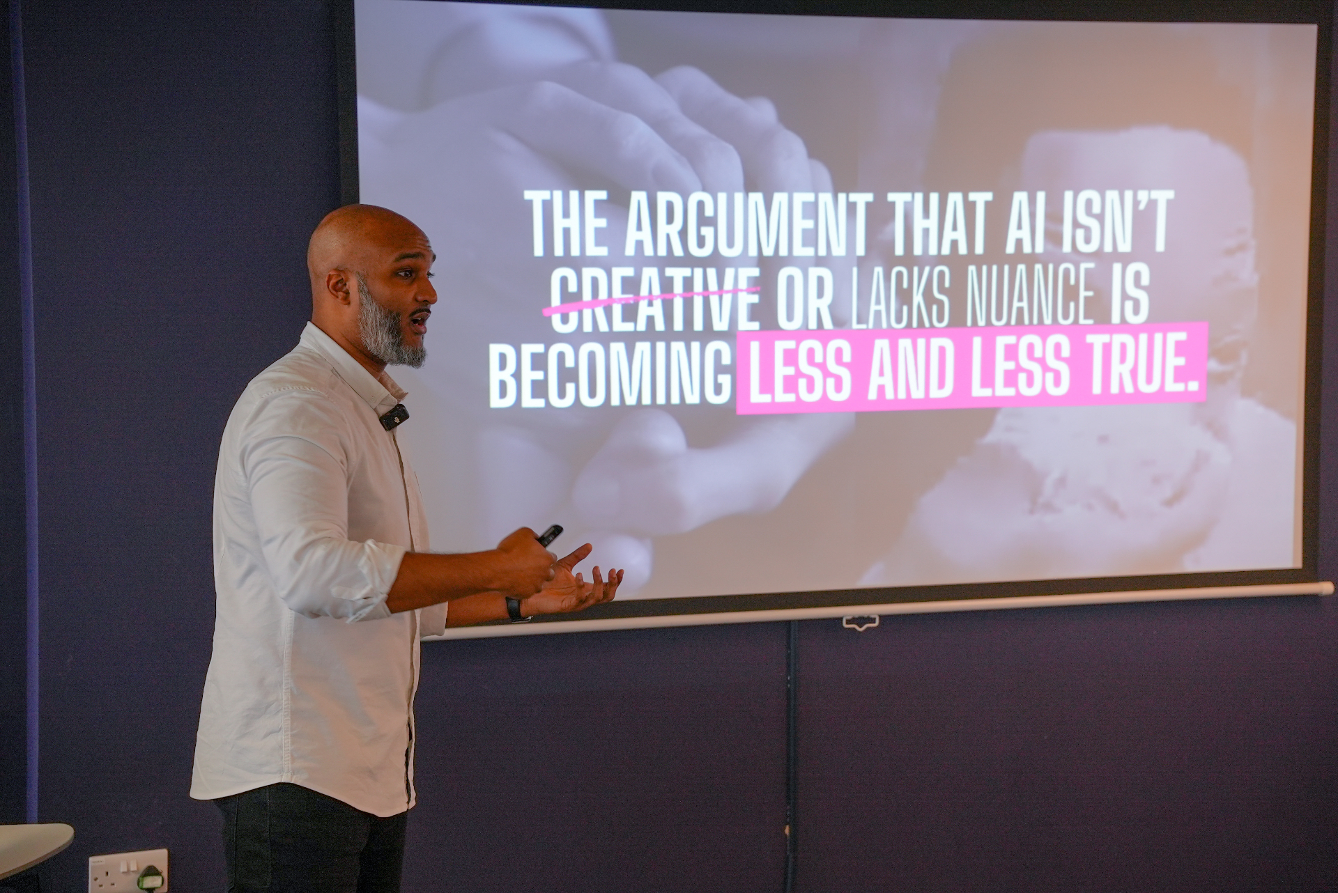 Dré Picart delivering a keynote speaking event